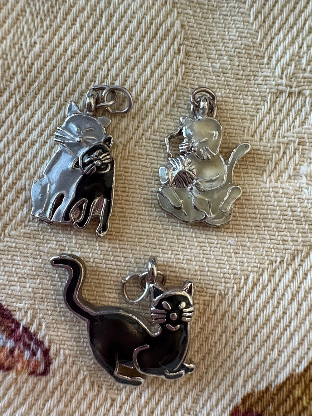 3 silver-tone cat charms